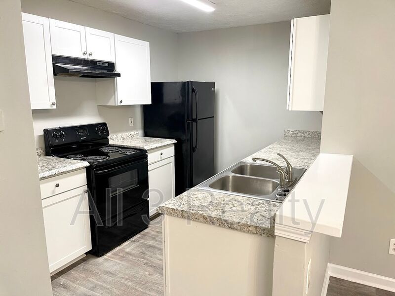 Welcome to this charming 3-bedroom, 2.5-bathroom townhouse located in the vibrant community of Lithonia, GA. property image