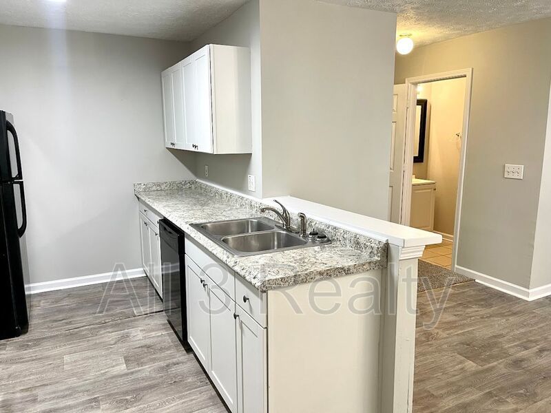 Welcome to this charming 3-bedroom, 2.5-bathroom townhouse located in the vibrant community of Lithonia, GA. property image