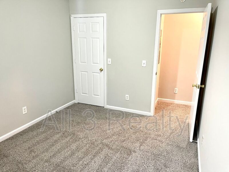 Welcome to this charming 3-bedroom, 2.5-bathroom townhouse located in the vibrant community of Lithonia, GA. property image
