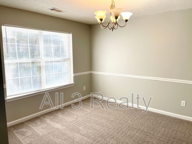 Welcome to this charming 3-bedroom, 2.5-bathroom home located in the desirable area of Ellenwood, GA. property image