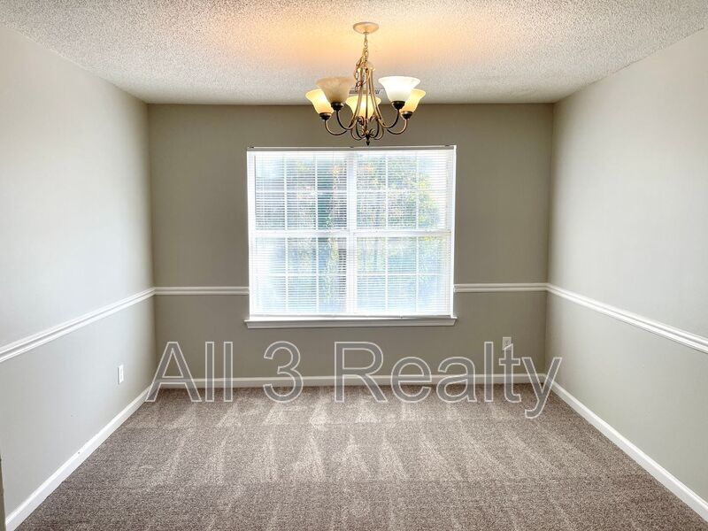 Welcome to this charming 3-bedroom, 2.5-bathroom home located in the desirable area of Ellenwood, GA. property image