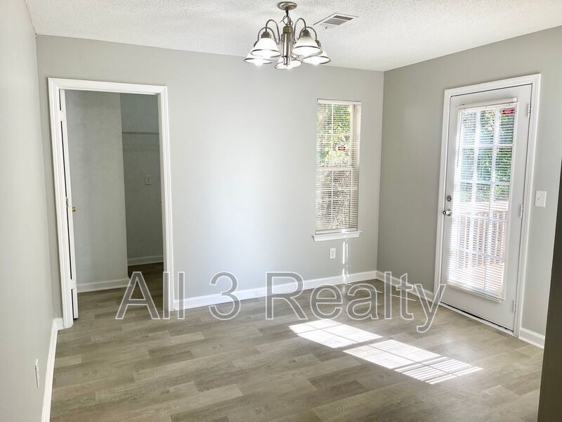 Welcome to this charming 3-bedroom, 2.5-bathroom home located in the desirable area of Ellenwood, GA. property image