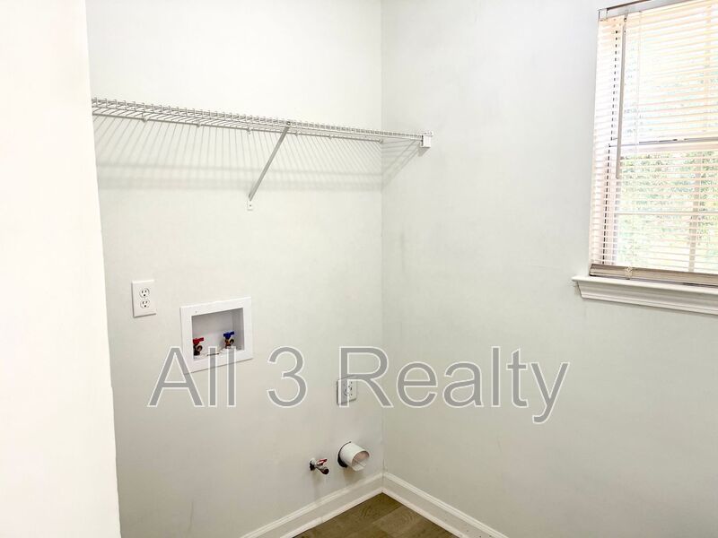 Welcome to this charming 3-bedroom, 2.5-bathroom home located in the desirable area of Ellenwood, GA. property image