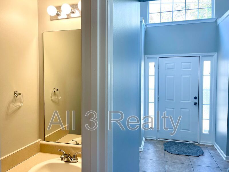 Welcome to this charming 3-bedroom, 2.5-bathroom home located in the desirable area of Ellenwood, GA. property image