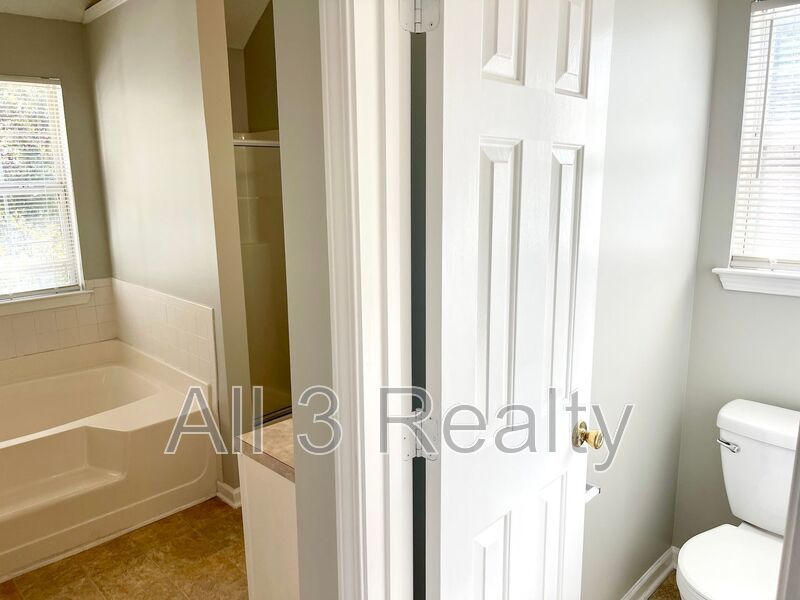 Welcome to this charming 3-bedroom, 2.5-bathroom home located in the desirable area of Ellenwood, GA. property image