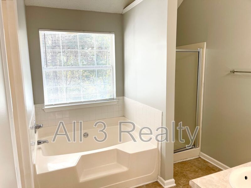 Welcome to this charming 3-bedroom, 2.5-bathroom home located in the desirable area of Ellenwood, GA. property image