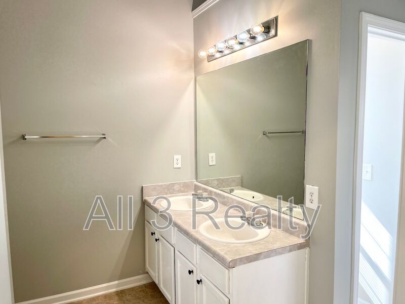 Welcome to this charming 3-bedroom, 2.5-bathroom home located in the desirable area of Ellenwood, GA. property image