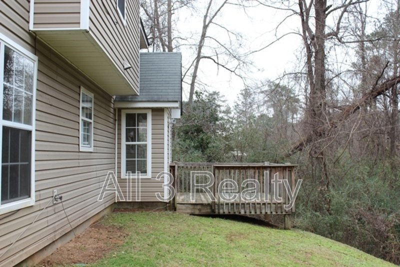 Welcome to this charming 3-bedroom, 2.5-bathroom home located in the desirable area of Ellenwood, GA. property image