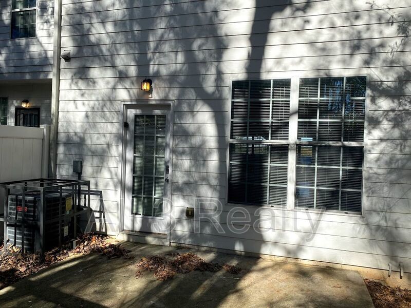 Welcome to this charming brick townhome in Lithonia, GA 2br/2.5 bath Townhome! property image