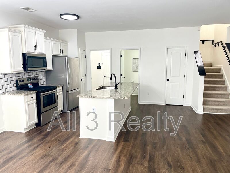 Special offer, Enjoy Half rent off for move-ins on or before December 24th!! Welcome to this stunning 4-bedroom, 2.5-bathroom townhome located in the vibrant community of Fairburn, GA. property image