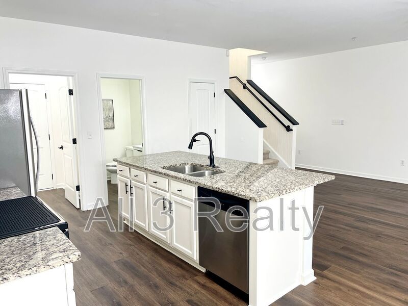 Special offer, Enjoy Half rent off for move-ins on or before December 24th!! Welcome to this stunning 4-bedroom, 2.5-bathroom townhome located in the vibrant community of Fairburn, GA. property image