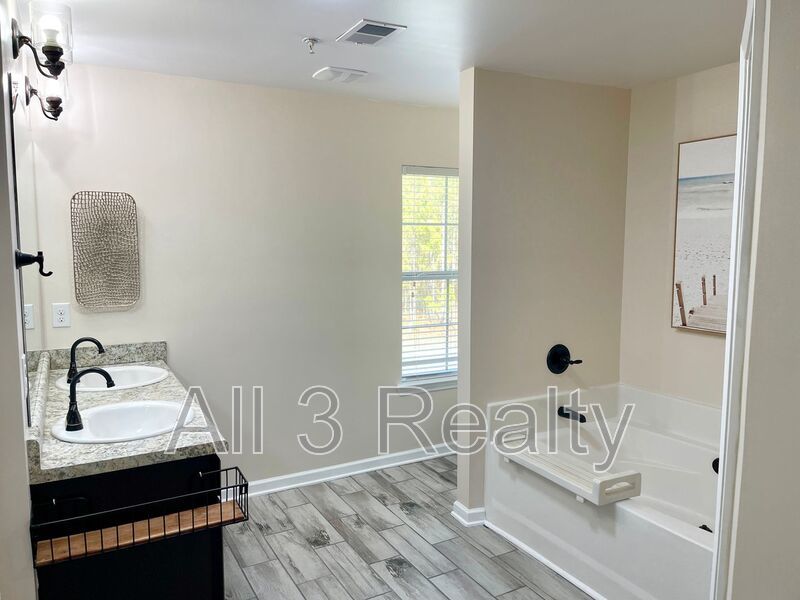 Special offer, Enjoy Half rent off for move-ins on or before December 24th!! Welcome to this stunning 4-bedroom, 2.5-bathroom townhome located in the vibrant community of Fairburn, GA. property image