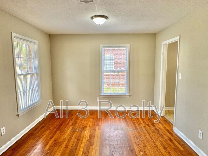 Charming 3-Bedroom Brick Home with Beautiful Hardwoods! property image