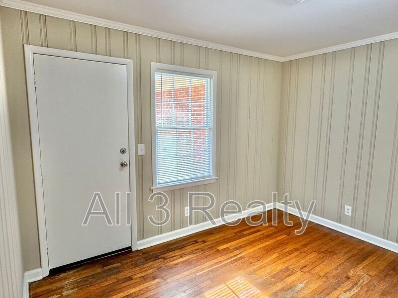 Charming 3-Bedroom Brick Home with Beautiful Hardwoods! property image