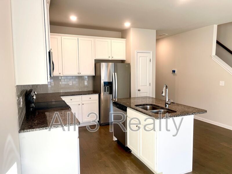 Welcome to this stunning 3-bedroom, 2.5-bathroom home located in the vibrant community of Lithonia, GA. property image