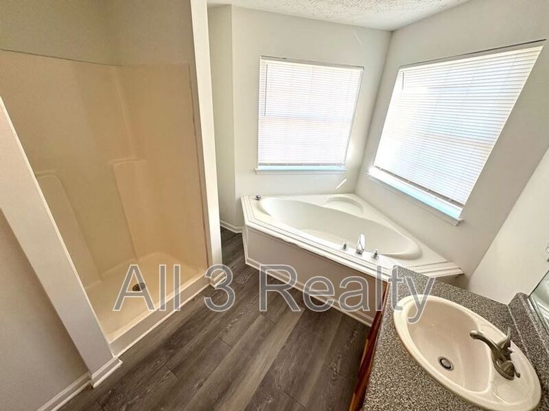 Welcome to this stunning two-story home located in the heart of McDonough, GA. This property boasts four spacious bedrooms and 2.5 well-appointed bathrooms. property image