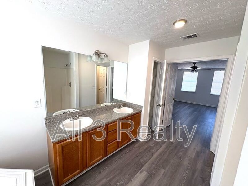 Welcome to this stunning two-story home located in the heart of McDonough, GA. This property boasts four spacious bedrooms and 2.5 well-appointed bathrooms. property image