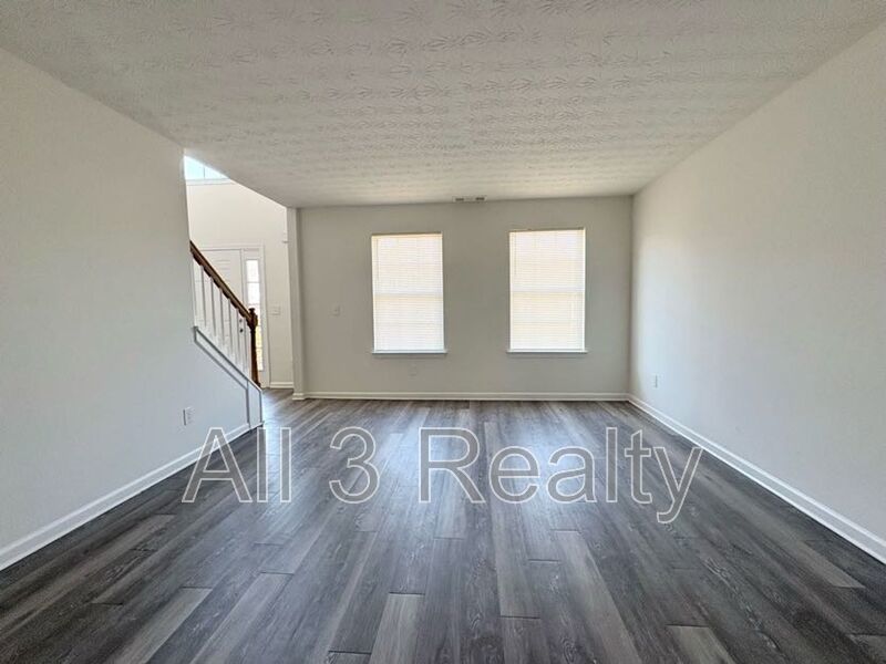 Welcome to this stunning two-story home located in the heart of McDonough, GA. This property boasts four spacious bedrooms and 2.5 well-appointed bathrooms. property image