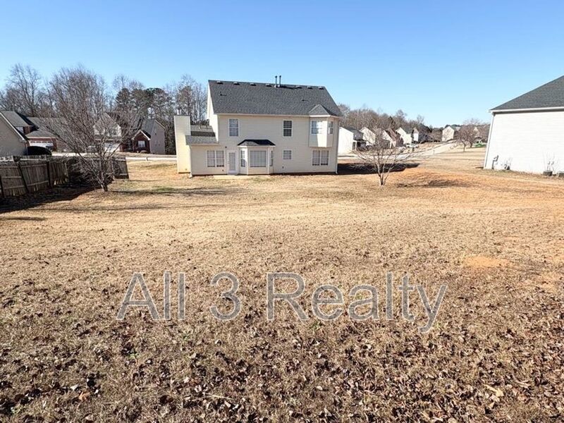 Welcome to this stunning two-story home located in the heart of McDonough, GA. This property boasts four spacious bedrooms and 2.5 well-appointed bathrooms. property image