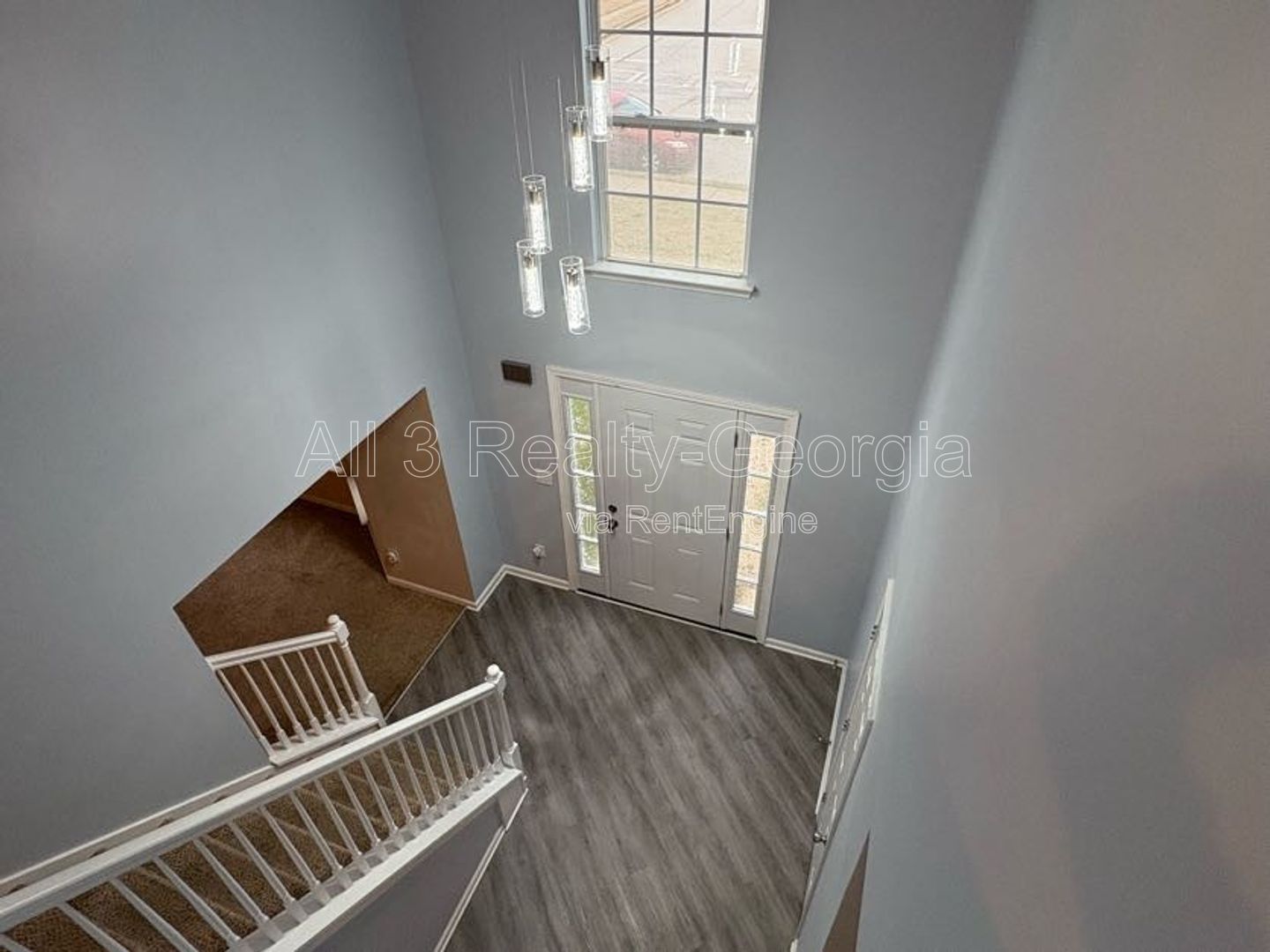 Welcome to this charming 4-bedroom, 2-bathroom home located in the desirable Hampton, GA. T property image