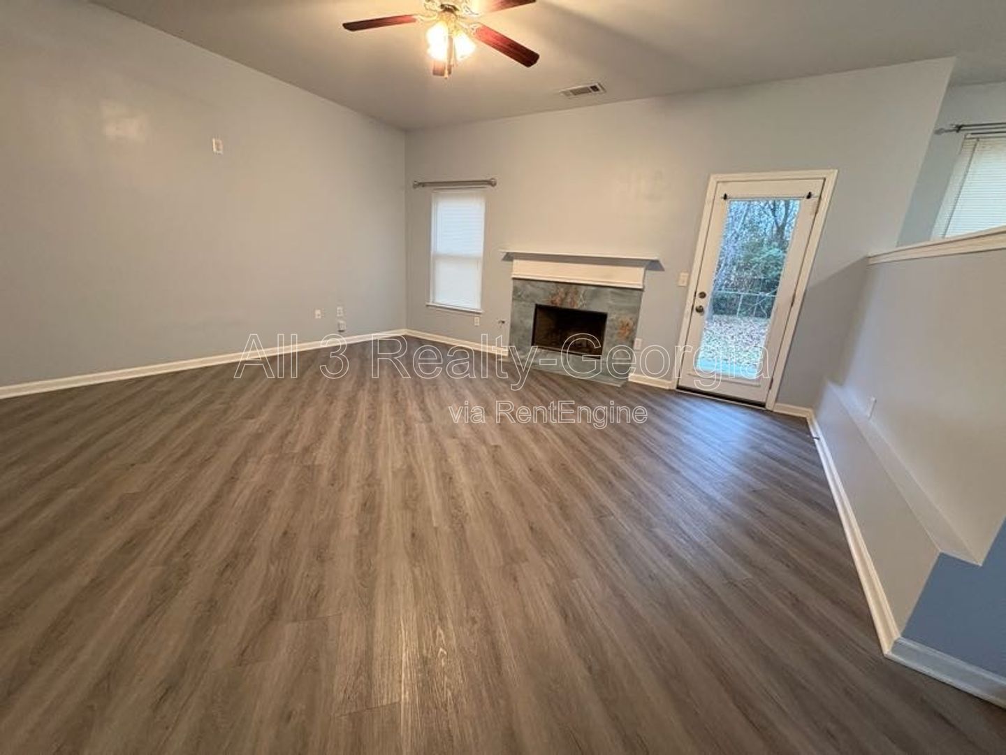 Welcome to this charming 4-bedroom, 2-bathroom home located in the desirable Hampton, GA. T property image