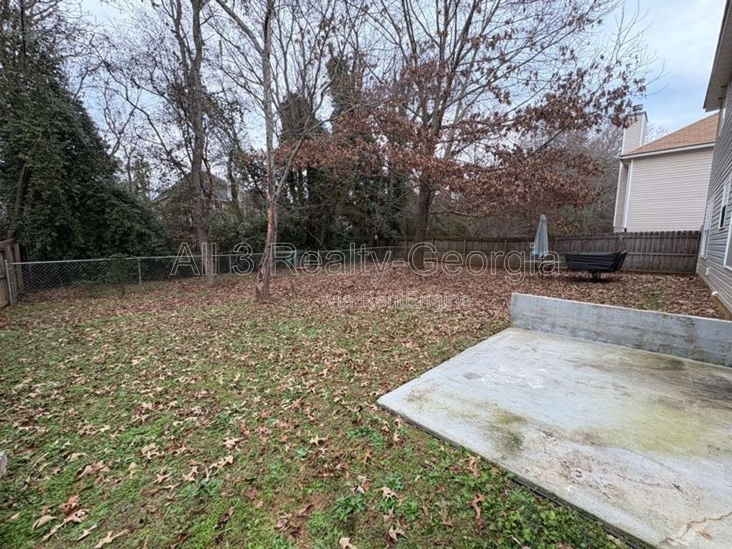 Welcome to this charming 4-bedroom, 2-bathroom home located in the desirable Hampton, GA. T property image