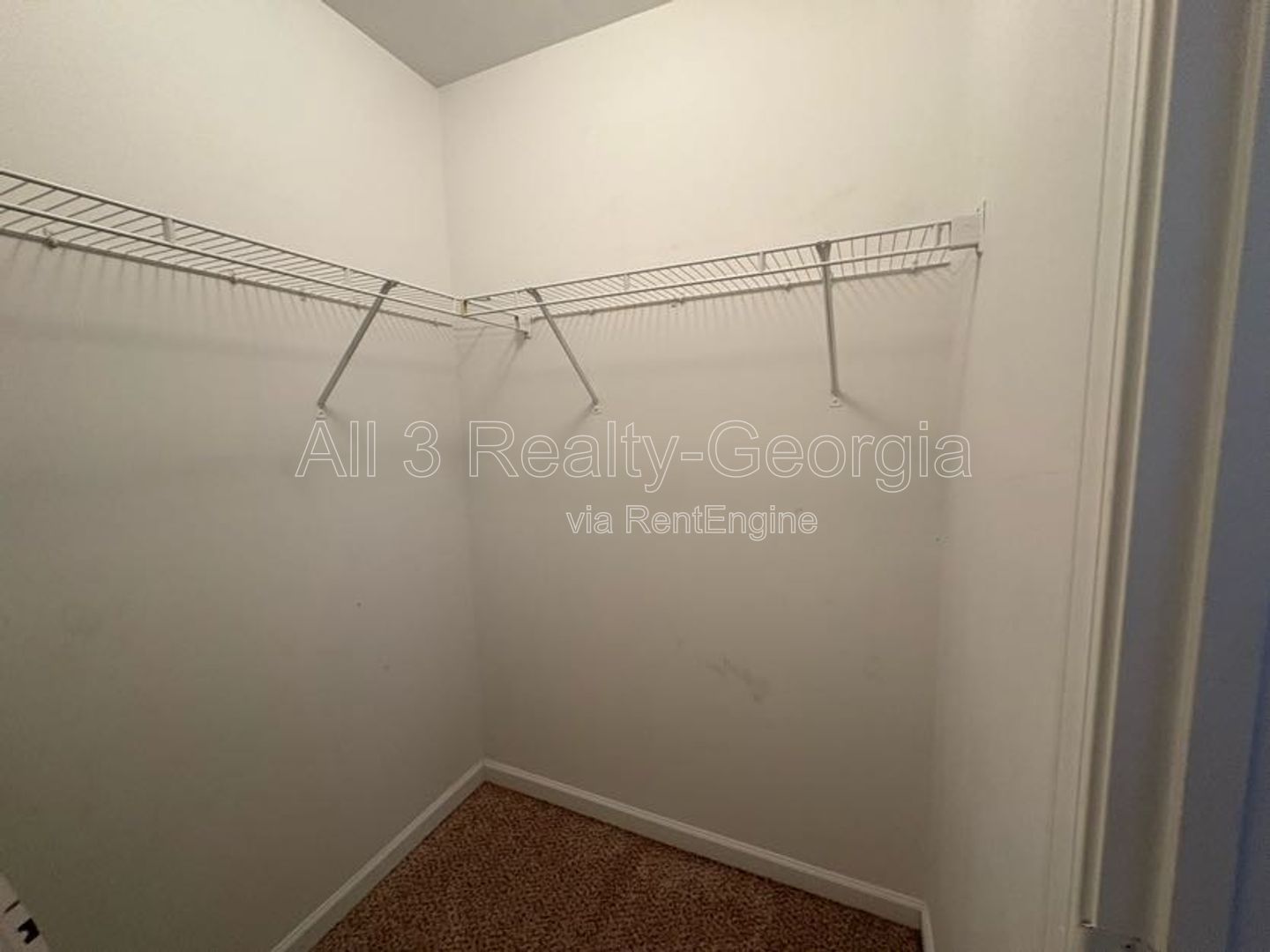 Welcome to this charming 4-bedroom, 2-bathroom home located in the desirable Hampton, GA. T property image