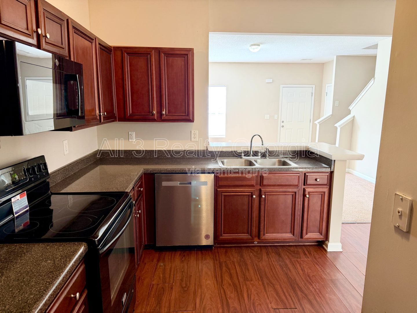 Welcome to this charming 2-bedroom, 2-bathroom corner townhome located in the vibrant community of College Park, GA. property image