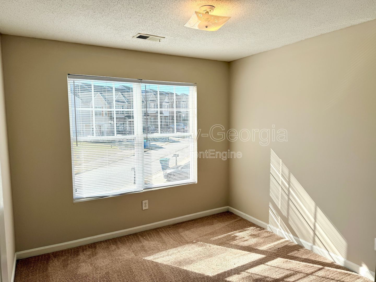 Welcome to this charming 2-bedroom, 2-bathroom corner townhome located in the vibrant community of College Park, GA. property image