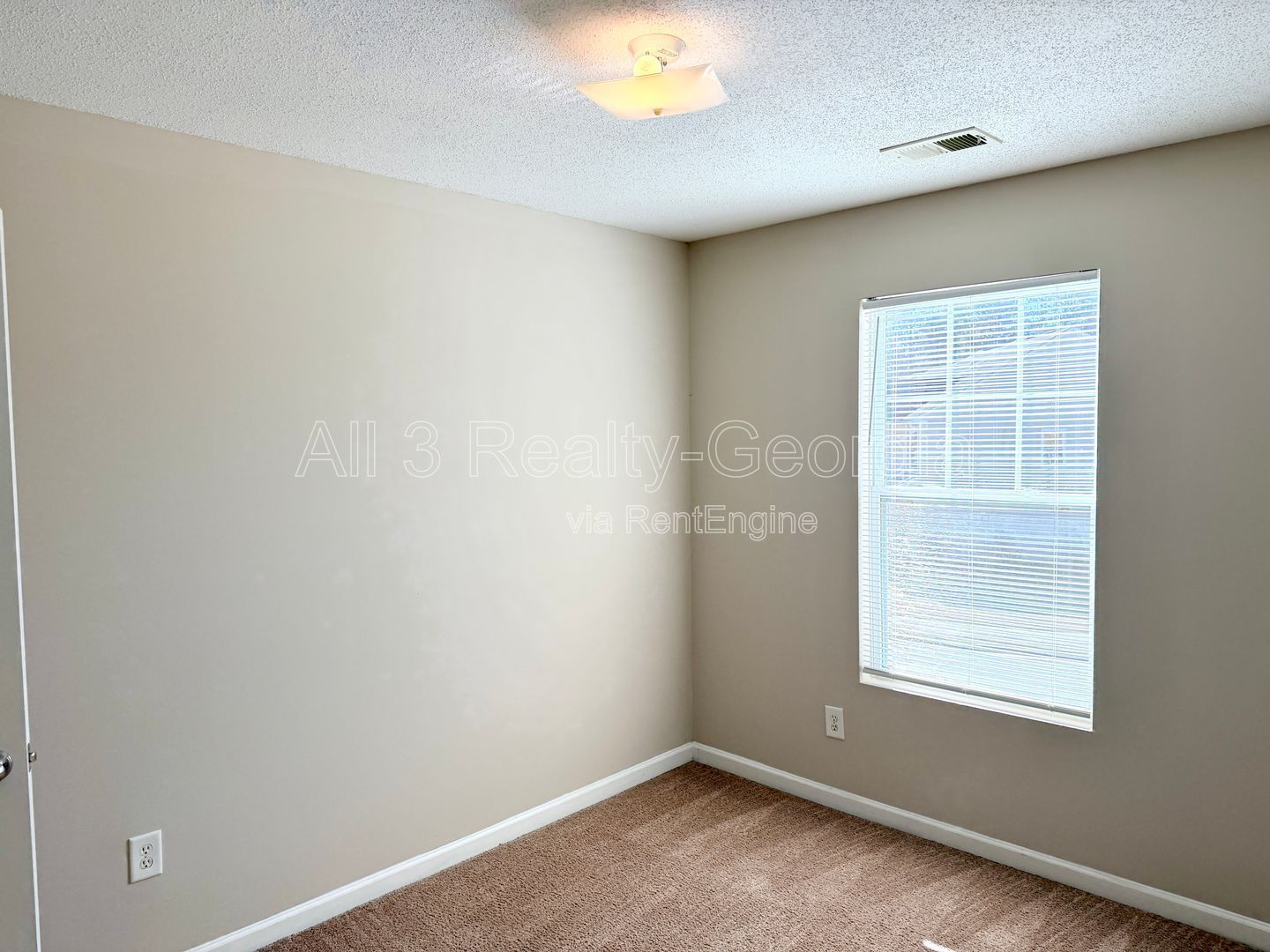 Welcome to this charming 2-bedroom, 2-bathroom corner townhome located in the vibrant community of College Park, GA. property image