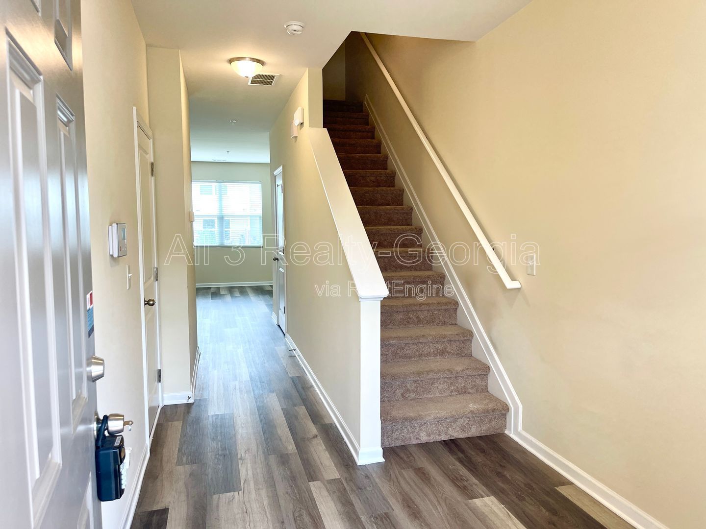 Introducing our charming townhouse located in Hampton, GA, featuring 3 bedrooms and 2.5 bathrooms. property image