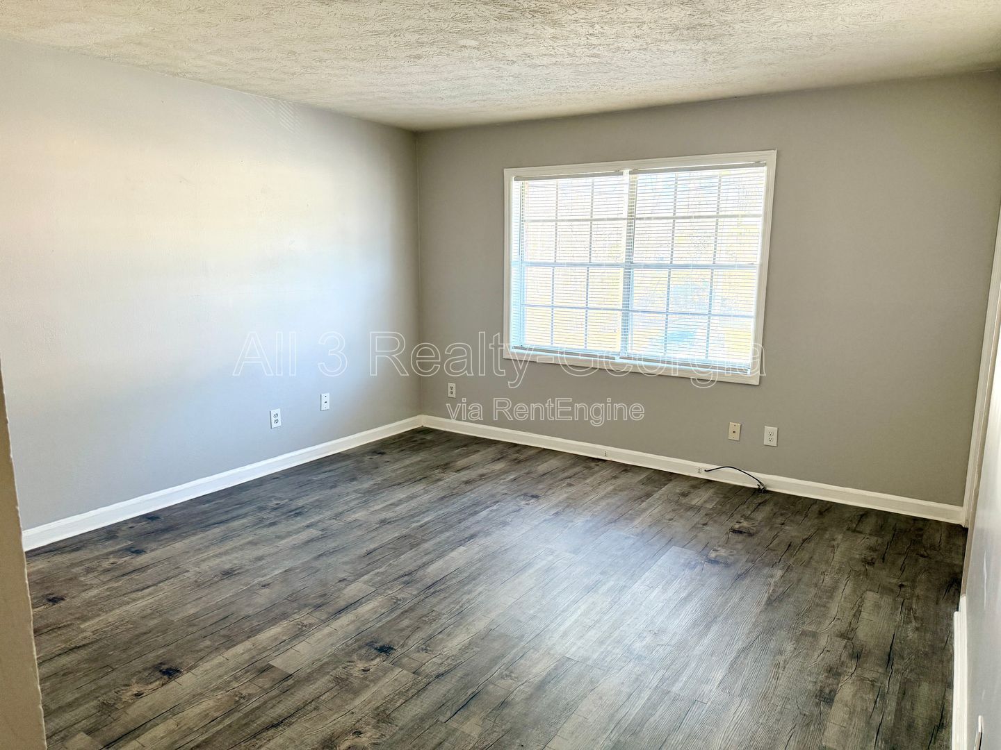 Welcome to this charming 2-bedroom, 1-bathroom home located in the vibrant community of Stockbridge, GA. Unit A-8 property image