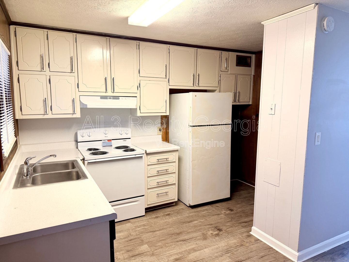 Welcome to this charming 2-bedroom, 1-bathroom home located in the vibrant community of Stockbridge, GA. Unit A-8 property image