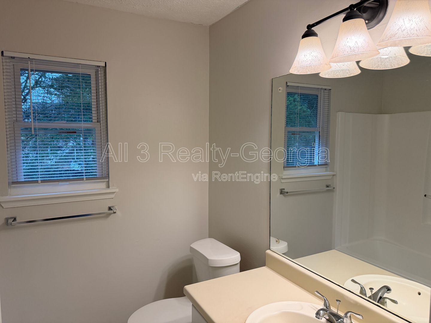 Welcome to this stylish and contemporary 2-bedroom, 1.5-bathroom corner townhome in Stockbridge! property image