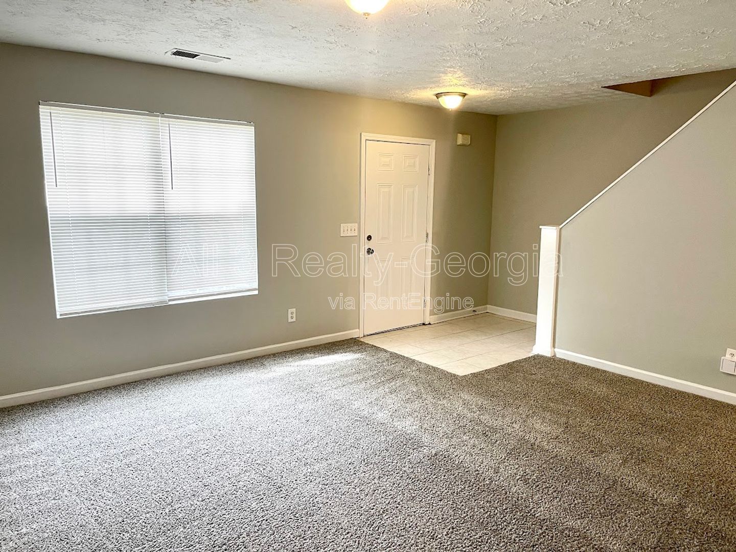 Welcome to this charming 3-bedroom, 2.5-bathroom townhouse located in the vibrant community of Lithonia, GA. property image