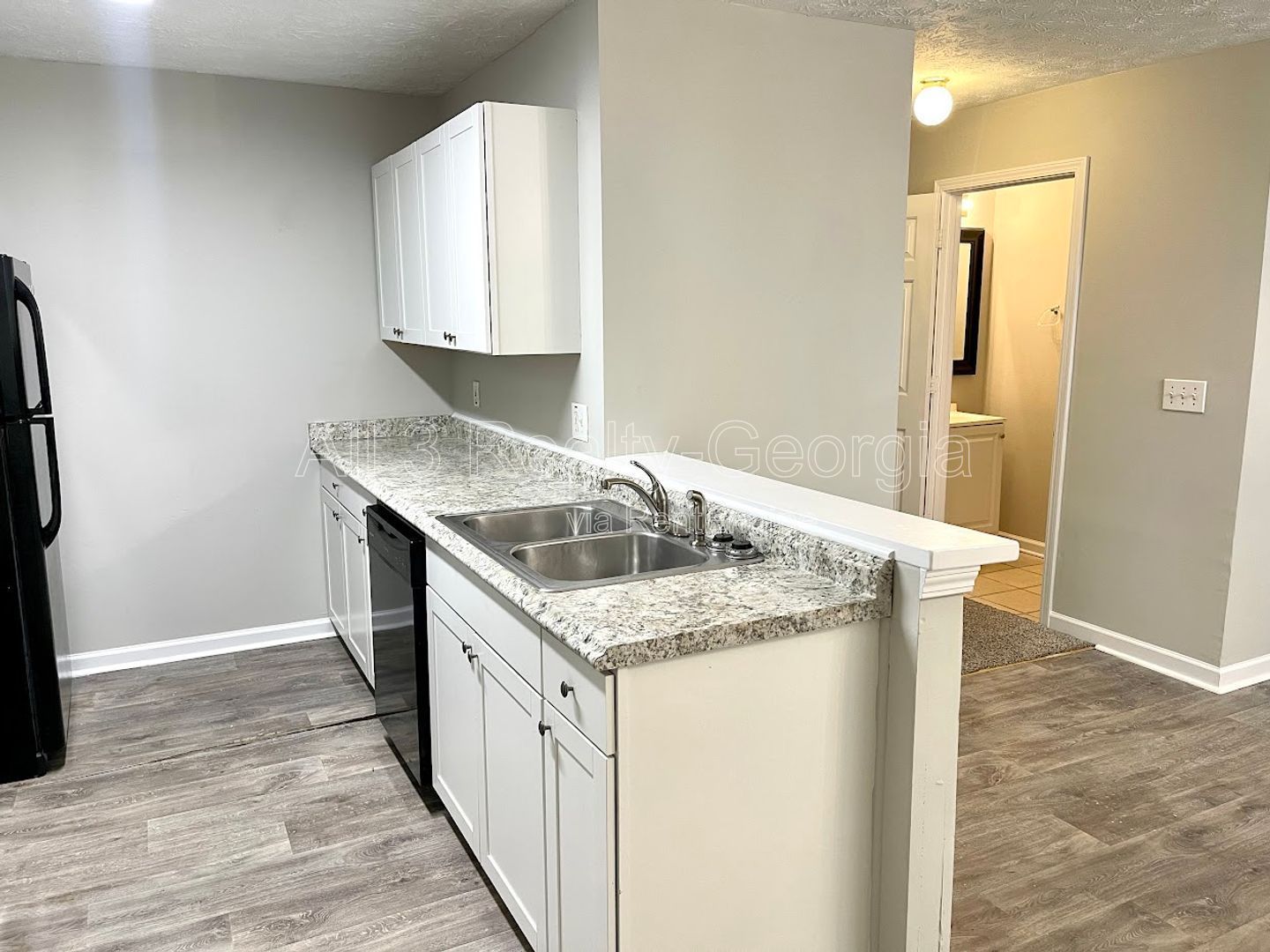 Welcome to this charming 3-bedroom, 2.5-bathroom townhouse located in the vibrant community of Lithonia, GA. property image