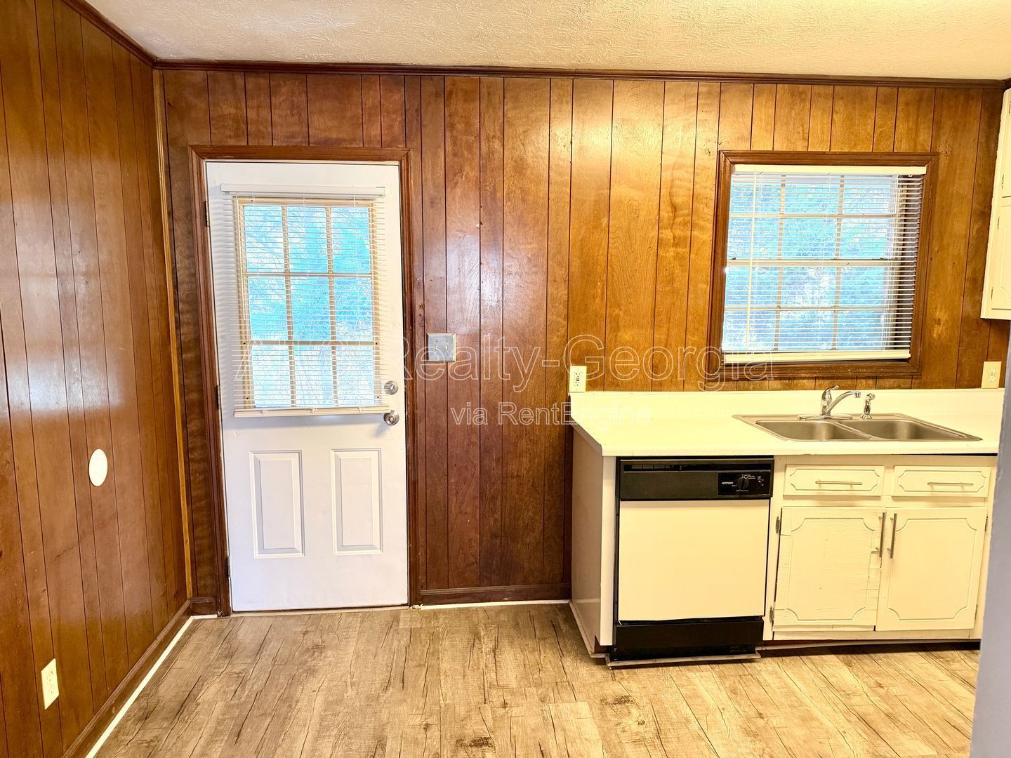 Welcome to this charming 2-bedroom, 1-bathroom home located in the vibrant community of Stockbridge, GA. Unit A-8 property image
