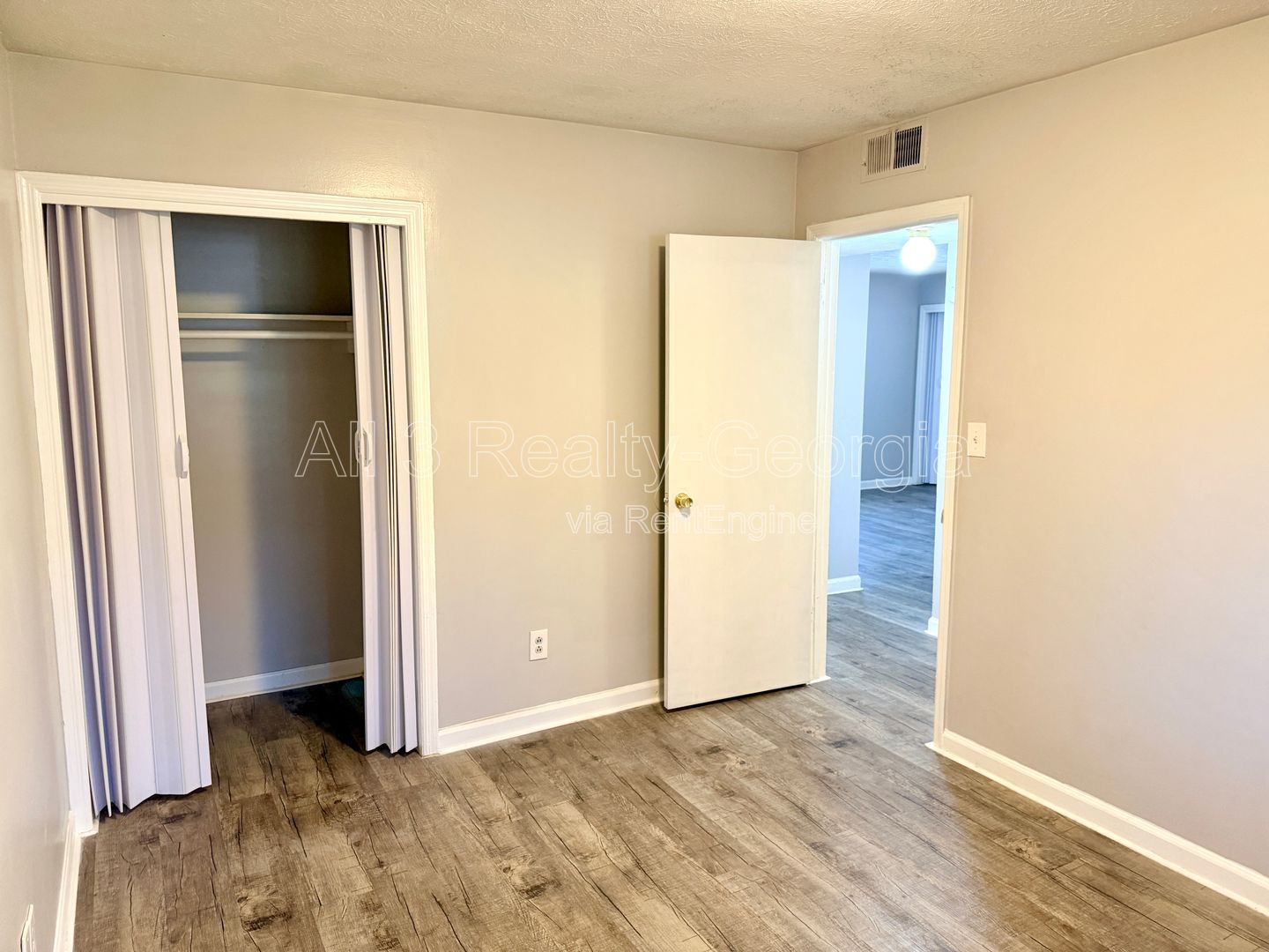 Welcome to this charming 2-bedroom, 1-bathroom home located in the vibrant community of Stockbridge, GA. Unit A-8 property image