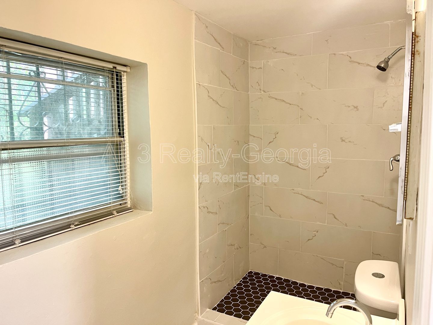 HALF OFF FIRST MONTH move-in on or before February 15t. Welcome to this stunning 4-bedroom, 2.5-bathroom home located in the vibrant community of College Park, GA. property image