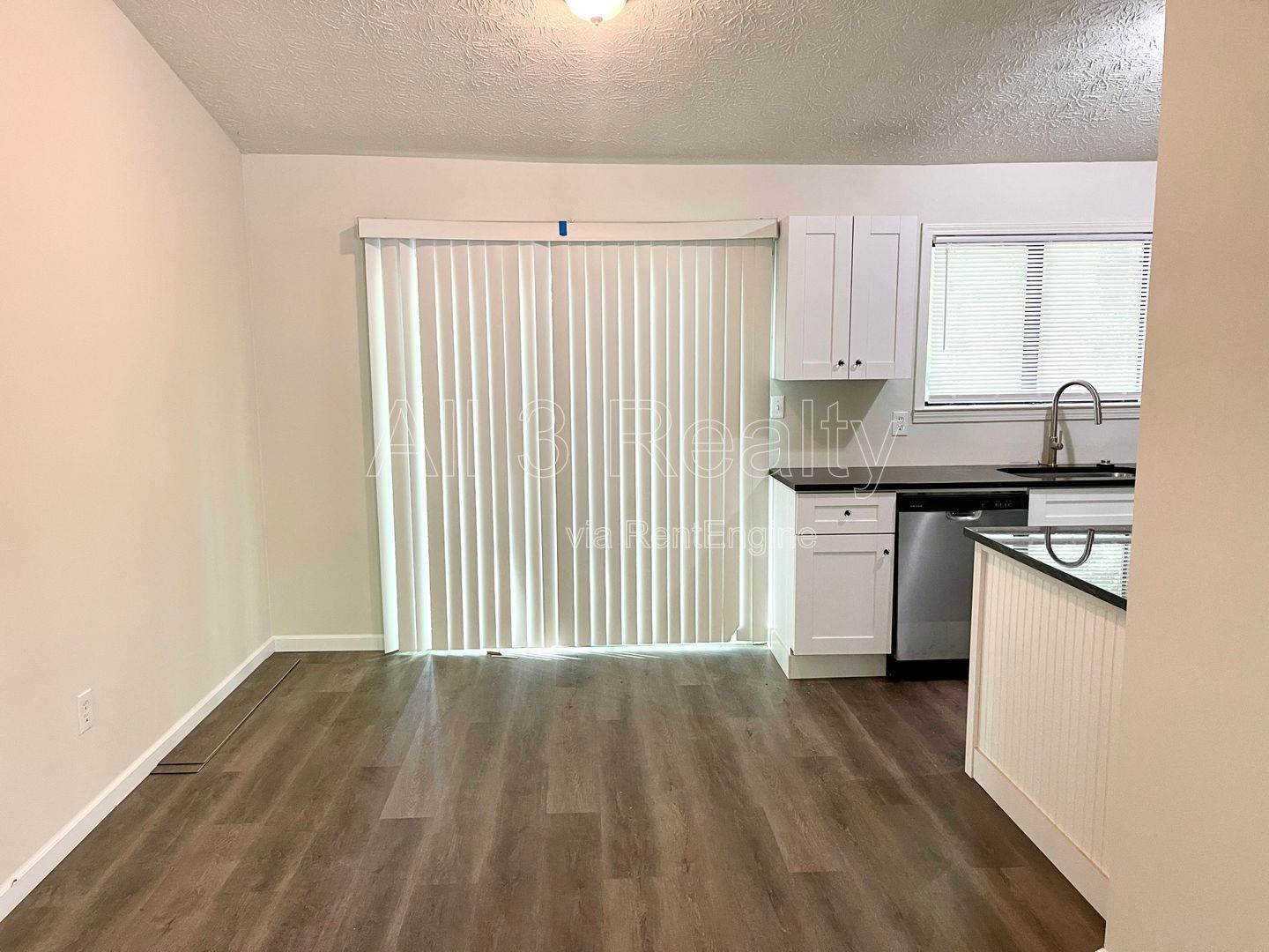 Welcome to this charming 3-bedroom, 2-bathroom home nestled in the heart of Stone Mountain, GA property image