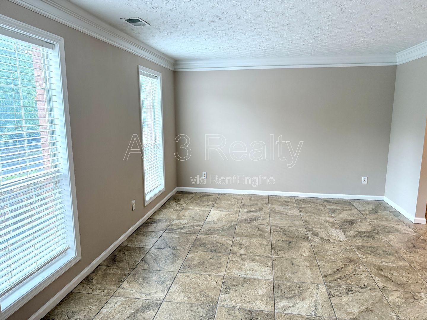 Charming 3-bedroom, 2.5-bath home in Lithonia, GA featuring a cozy fireplace and ceiling fans throughout. property image