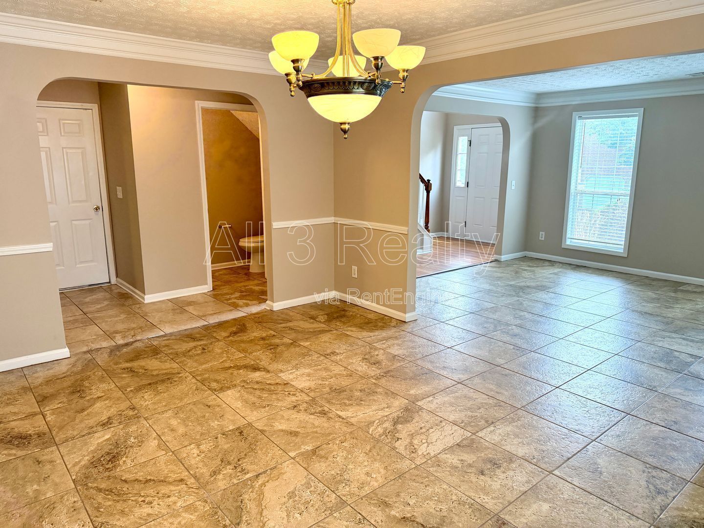 Charming 3-bedroom, 2.5-bath home in Lithonia, GA featuring a cozy fireplace and ceiling fans throughout. property image