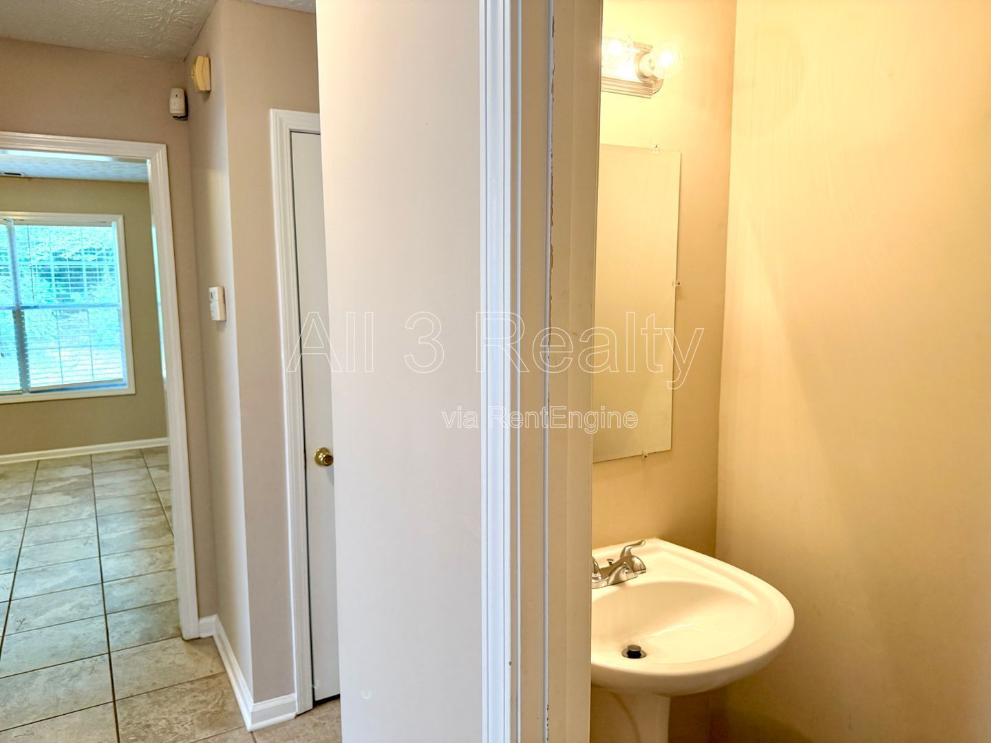 Charming 3-bedroom, 2.5-bath home in Lithonia, GA featuring a cozy fireplace and ceiling fans throughout. property image