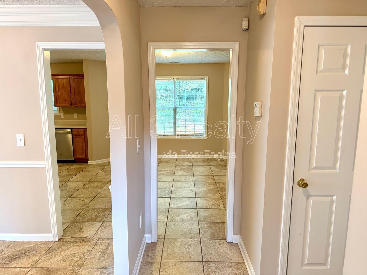 Charming 3-bedroom, 2.5-bath home in Lithonia, GA featuring a cozy fireplace and ceiling fans throughout. property image