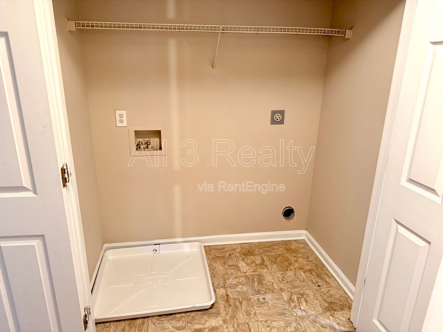 Charming 3-bedroom, 2.5-bath home in Lithonia, GA featuring a cozy fireplace and ceiling fans throughout. property image