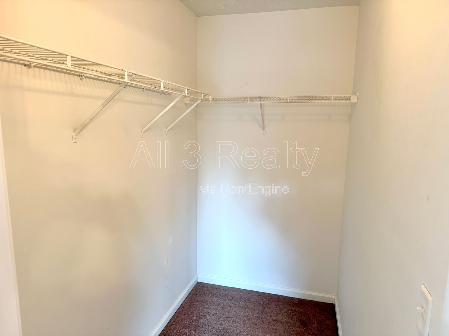 Charming 3-bedroom, 2.5-bath home in Lithonia, GA featuring a cozy fireplace and ceiling fans throughout. property image