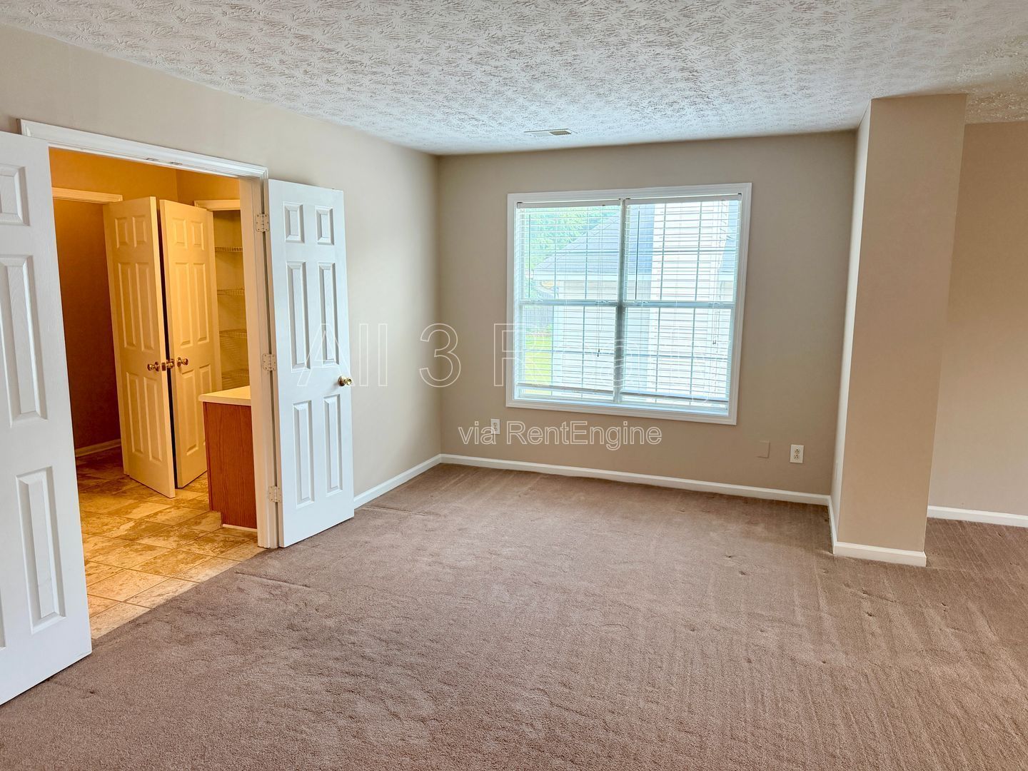 Charming 3-bedroom, 2.5-bath home in Lithonia, GA featuring a cozy fireplace and ceiling fans throughout. property image