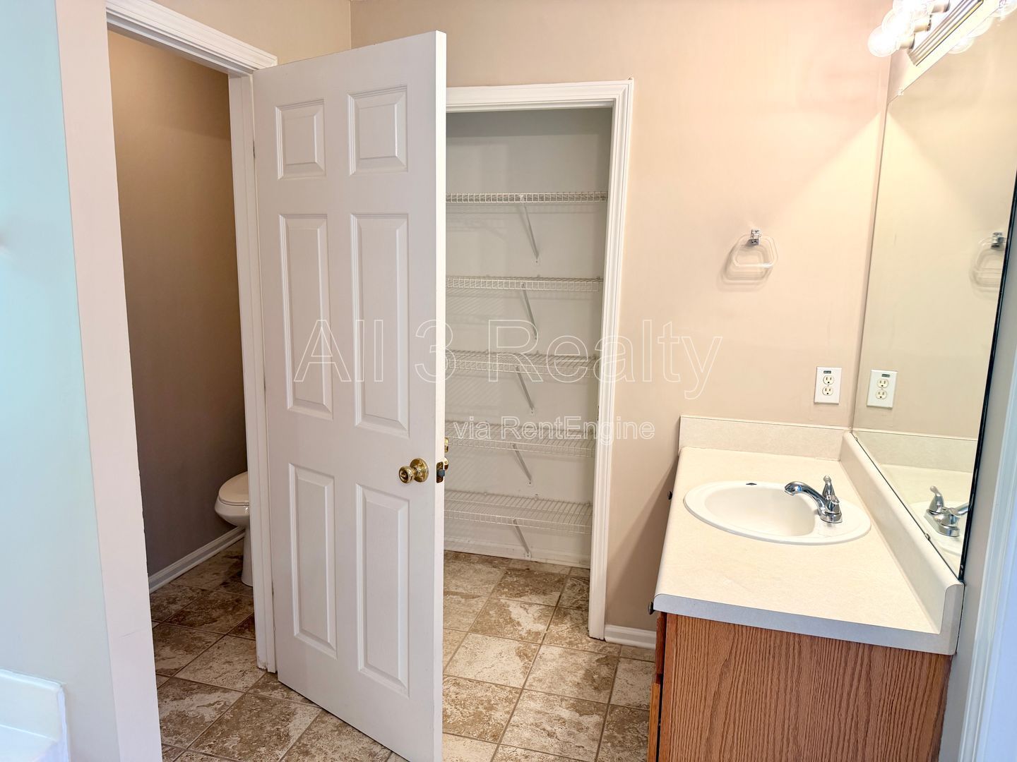 Charming 3-bedroom, 2.5-bath home in Lithonia, GA featuring a cozy fireplace and ceiling fans throughout. property image