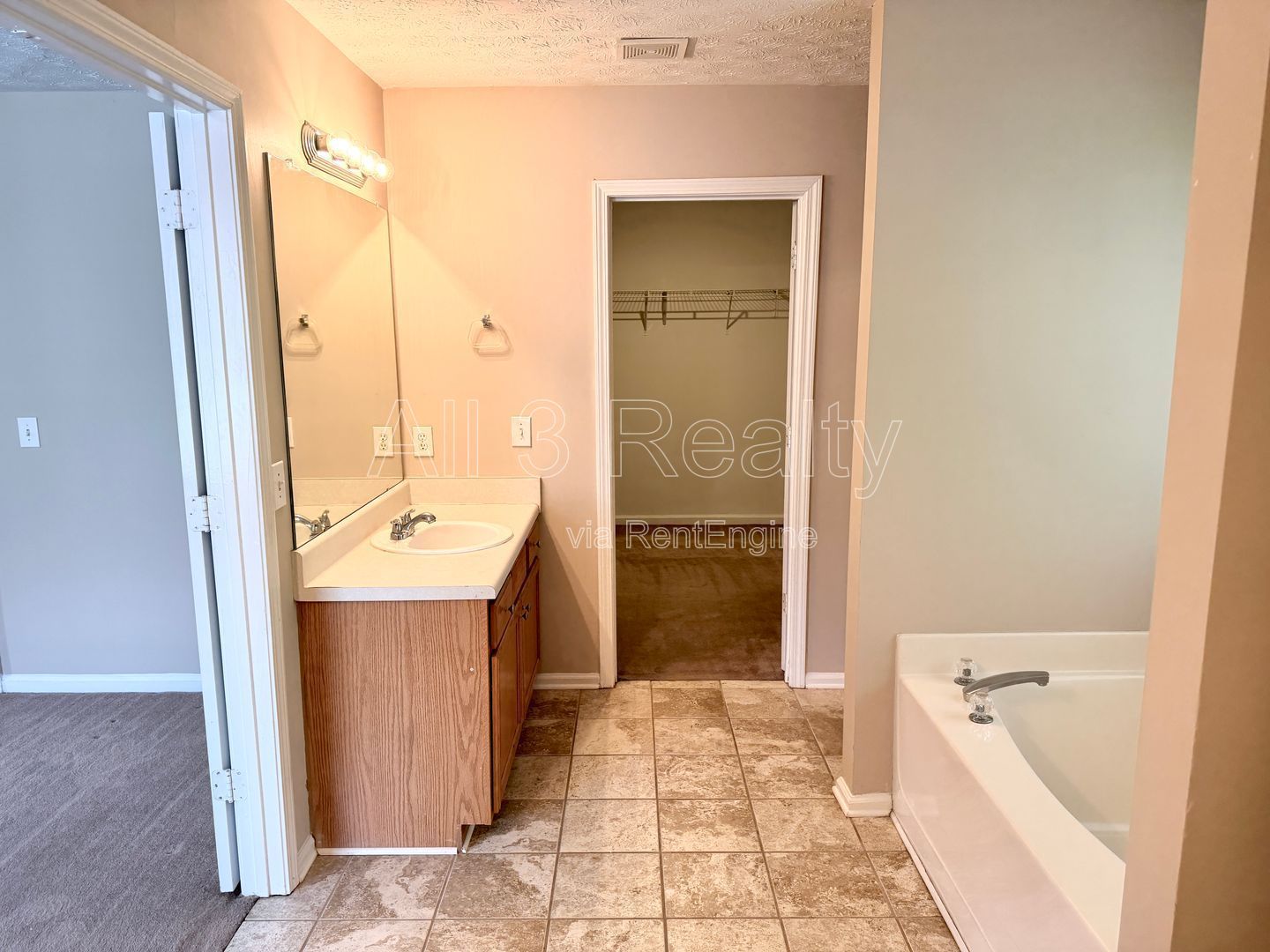Charming 3-bedroom, 2.5-bath home in Lithonia, GA featuring a cozy fireplace and ceiling fans throughout. property image
