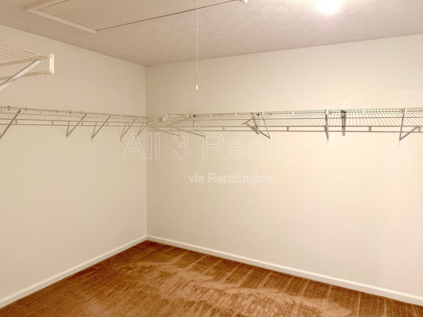 Charming 3-bedroom, 2.5-bath home in Lithonia, GA featuring a cozy fireplace and ceiling fans throughout. property image